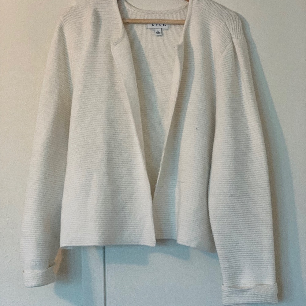 White sweater by Elle.